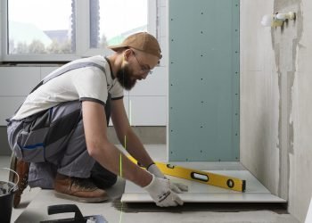 tiler-working-renovation-apartment (1)